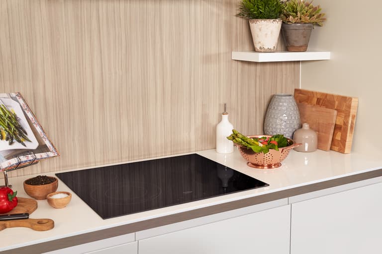 HIC64402T This sleek and stylish 60cm Ceramic Hob with Touch Controls has four responsive heating zones with dual zone flexibility. While the child lock and heat indicators offer added peace of mind, displaying a visible 'H' to warn you if the hob has not cooled down enough, the hob's frameless finish makes it ideal for integrating into your kitchen design.