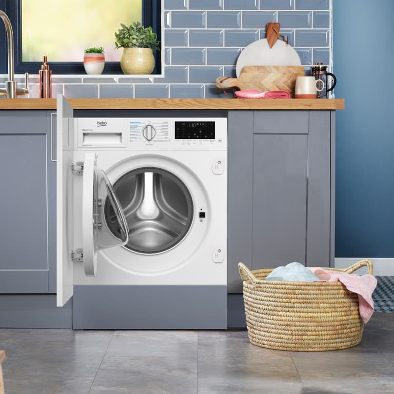 WDIK854411F Perfect for busy households, this integrated washer dryer can wash a full 8kg load in just 28 minutes, helping you get through laundry faster. Sensor Drying Programmes automatically stop the cycle when optimal dryness is reached, protecting your clothes from over-drying. Easy to install, the appliance features front adjustment screws to reposition the rear feet without hassle. For added peace of mind, it’s backed by our 10 Year Beko Parts Guarantee.